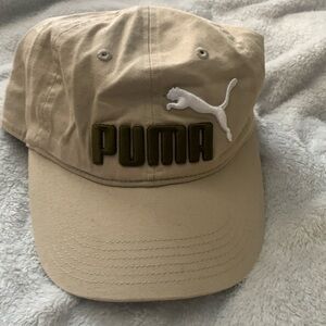 Tan puma hat adjustable hardly ever worn